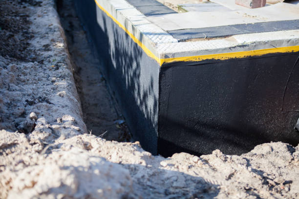 Professional Waterproofing technician working in Prairie Creek, IN